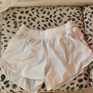Size 4 White Lululemon shorts! 4” Inseam